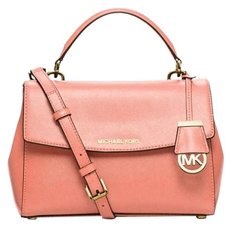 peach michael kors purse.